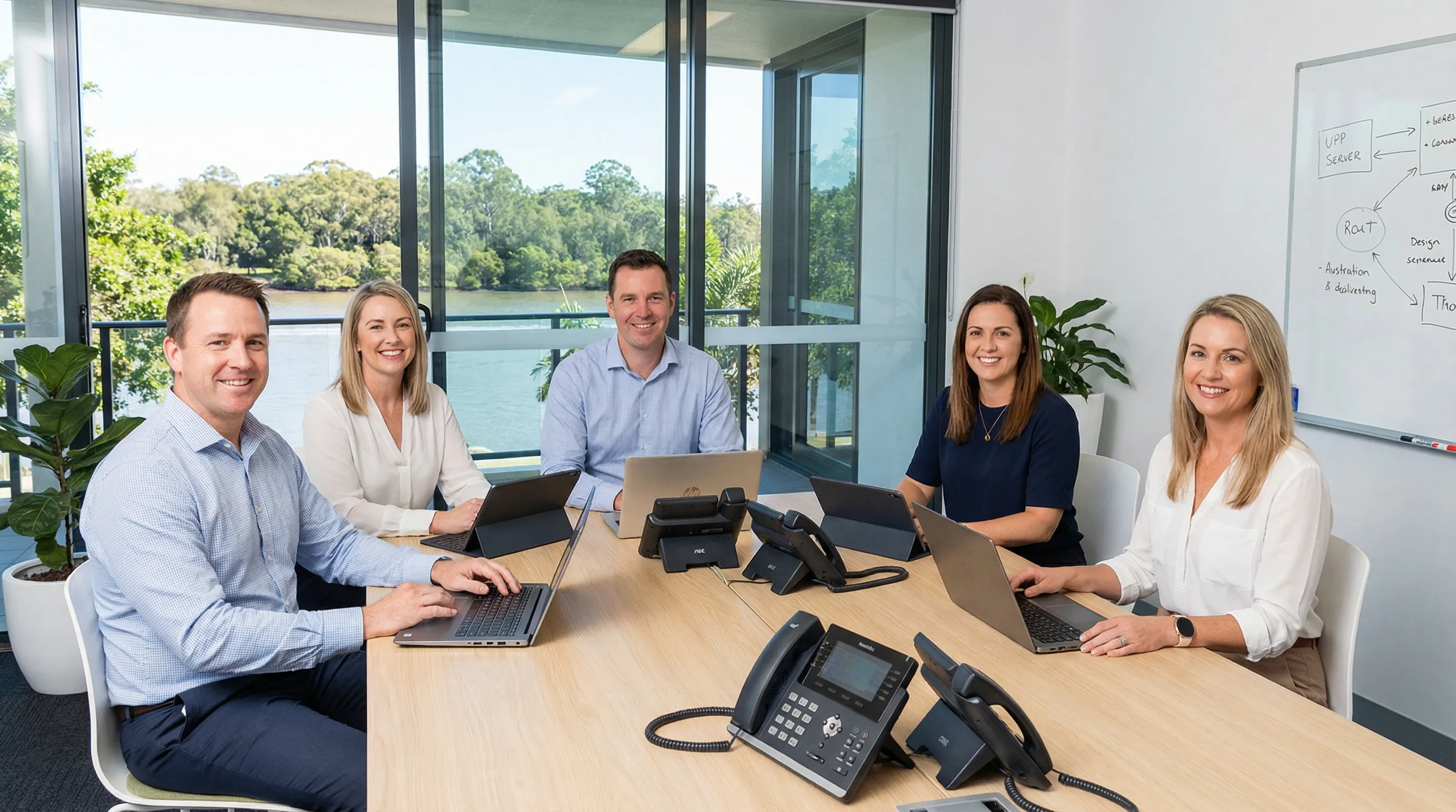 The Phones Now team gathered in their Brisbane office, ready to help your business